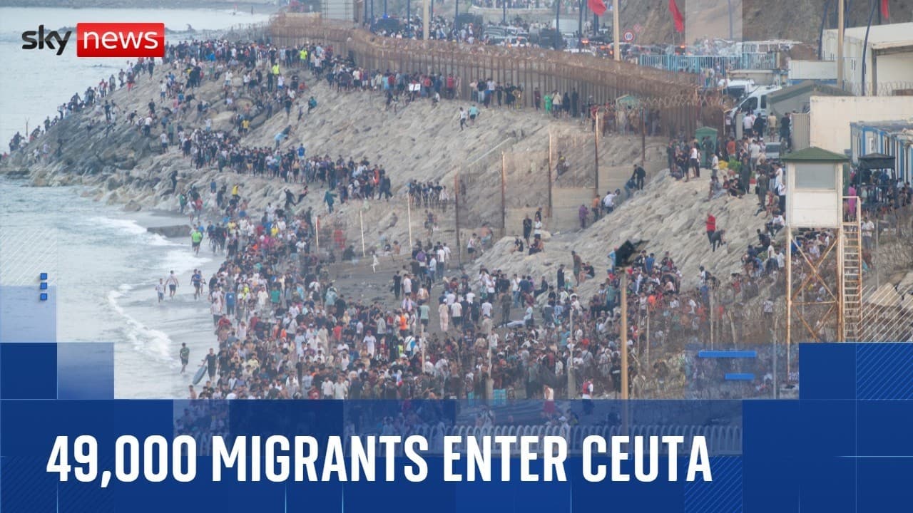 18 dead as almost 50,000 migrants enter Spanish enclave from Morocco