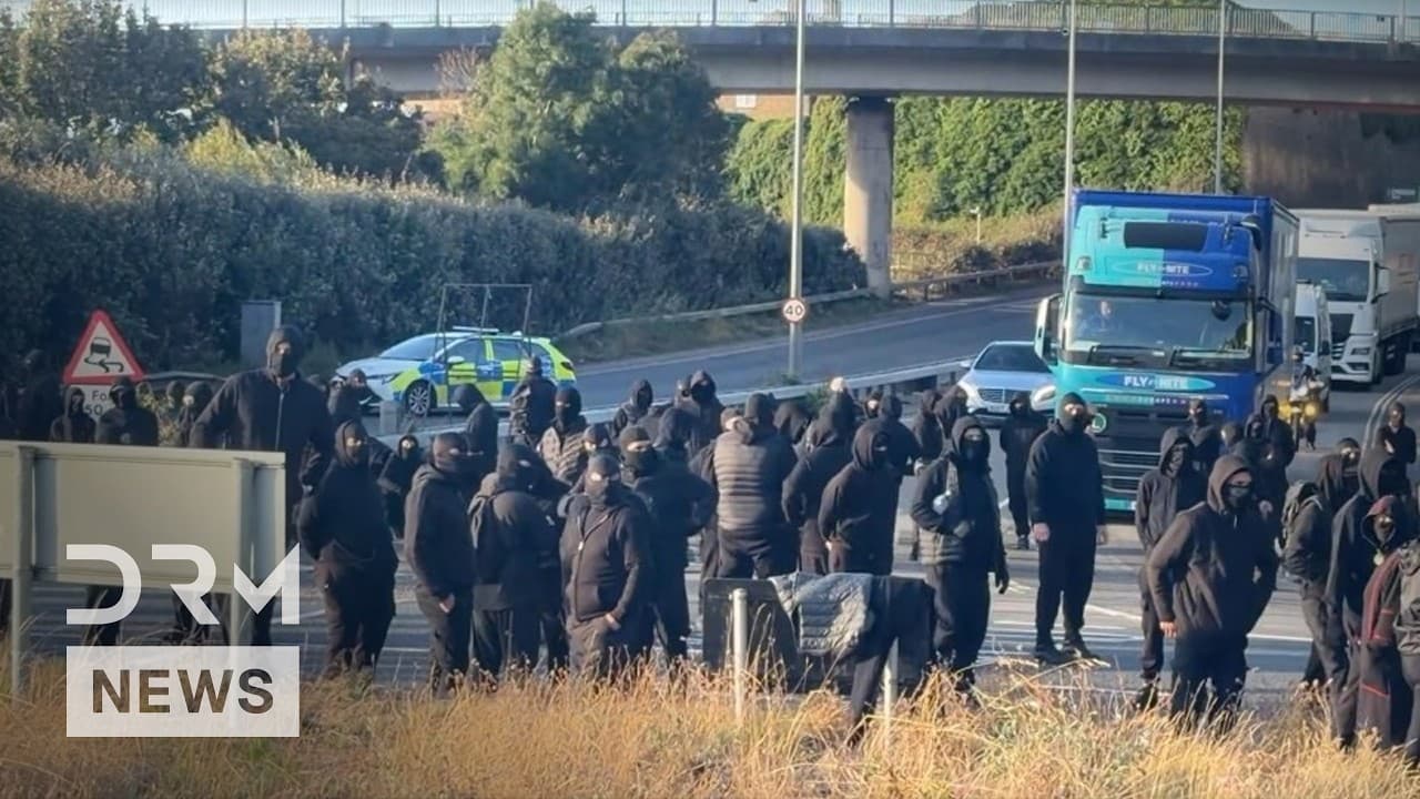 FULL VIDEO: Masked Protesters Block England’s Port of Dover Chanting ‘Stop the Boats’ | AC1B